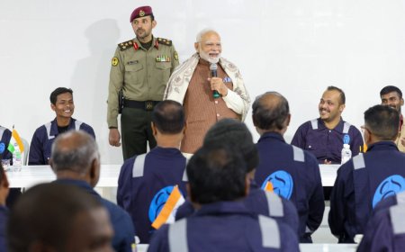 PM Modi meets Indian migrant workers at Gulf Spic Labour Camp in Kuwait