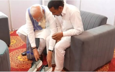 Modi meets fan who walked barefoot for 14 years to see him as PM