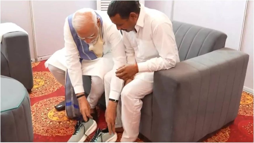 Modi meets fan who walked barefoot for 14 years to see him as PM