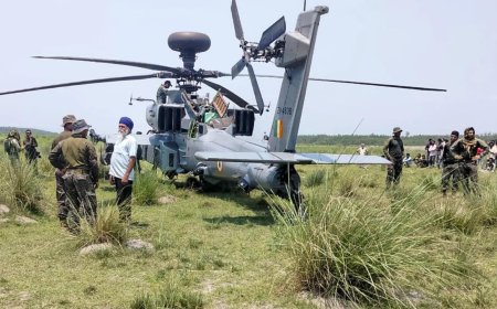Apache lands safely after mid-air snag
