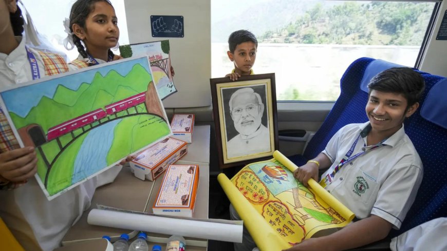 Excited schoolkids get a joyride on train's debut run