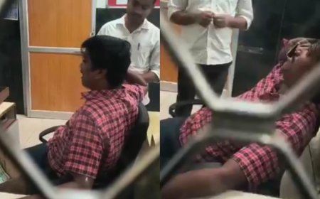 Watch: Viral video of Karnataka railway clerk on phone ignoring passengers sparks outrage; official dismissed after backlash