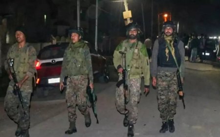 J&amp;K encounter under way: Cop killed, terrorists trapped; heavy firing reported