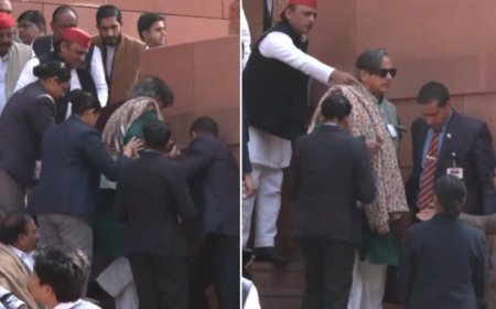 Shashi Tharoor trips and falls at Parliament stairs; Akhilesh Yadav helps - video